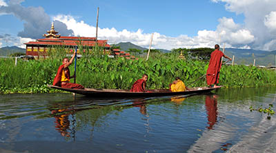  Burma -  Monks rowing their own canoe  at Inle Lake